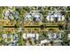 Community overview with canal and homes at 418 Water St, Kissimmee, FL 34747