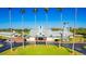 Picturesque clubhouse entrance with palm trees at 418 Water St, Kissimmee, FL 34747