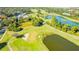 Aerial of golf course with water features at 418 Water St, Kissimmee, FL 34747