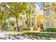Beautiful two-story townhome with front porch and landscaping at 418 Water St, Kissimmee, FL 34747