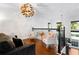 Upstairs loft area with hardwood floors and comfortable seating at 418 Water St, Kissimmee, FL 34747