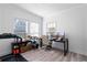 Bright home office features hardwood floors, large windows, and built-in shelving at 418 Water St, Kissimmee, FL 34747