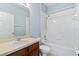 Full bathroom with tub, toilet and vanity at 755 Kildrummy Dr, Davenport, FL 33896