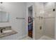 Bathroom with a large walk-in shower and a walk-in closet at 8279 Nemours Pkwy, Orlando, FL 32827