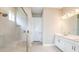 Spa-like bathroom with double vanity and large shower at 857 Arbor Green Trl, St Cloud, FL 34771