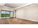 Living room with sliding glass doors and view of backyard at 857 Arbor Green Trl, St Cloud, FL 34771