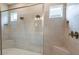 Spacious shower with dual shower heads and built-in seating at 857 Arbor Green Trl, St Cloud, FL 34771