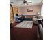 Living room with leather sofa and wood floors at 910 Rangeline Rd, Longwood, FL 32750