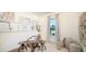 Cozy home office featuring a rustic wooden desk and shelving at 919 Tassleflower Trl, St Cloud, FL 34771