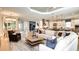 Open floor plan showcasing the living area, dining area, and kitchen at 932 Tassleflower Trl, Saint Cloud, FL 34771