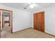 Bright bedroom with neutral walls and carpet at 120 Trafalgar Pl, Longwood, FL 32779