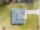 Aerial view of a new single-story house with gray roof and driveway at 3041 Sw 168Th Loop, Ocala, FL 34473