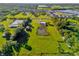 Aerial view of property showing house and surrounding land at 3145 Packard Ave, Saint Cloud, FL 34772