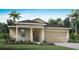 One-story home with a two-car garage, stone accents, and landscaping at 3529 Banana Shrub Blvd, Clermont, FL 34711