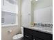 Clean bathroom with granite countertop and walk-in shower at 4428 Kaipo Rd, Davenport, FL 33897