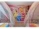 Two twin beds with princess theme, canopy beds and mural at 4428 Kaipo Rd, Davenport, FL 33897