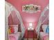 Princess-themed bedroom with canopy beds at 4428 Kaipo Rd, Davenport, FL 33897