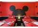Mickey Mouse-themed bedroom with twin beds at 4428 Kaipo Rd, Davenport, FL 33897