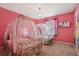 Princess-themed bedroom with canopy beds at 4428 Kaipo Rd, Davenport, FL 33897