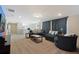 Spacious game room featuring a sectional sofa and large windows at 4428 Kaipo Rd, Davenport, FL 33897
