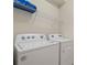 Convenient laundry room with Whirlpool washer and dryer at 4428 Kaipo Rd, Davenport, FL 33897