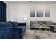 Cozy living room featuring a sectional sofa and stylish coffee table at 4428 Kaipo Rd, Davenport, FL 33897