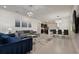 Open concept living room, dining, and kitchen at 4428 Kaipo Rd, Davenport, FL 33897