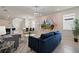 Open floor plan living area with stylish decor at 4428 Kaipo Rd, Davenport, FL 33897