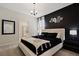 Spacious main bedroom with a king-size bed and ensuite bathroom at 4428 Kaipo Rd, Davenport, FL 33897