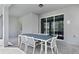 Outdoor patio with table and chairs, perfect for dining at 4428 Kaipo Rd, Davenport, FL 33897