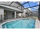 Relaxing pool and spa area with screened enclosure at 4428 Kaipo Rd, Davenport, FL 33897