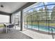 Enjoy this screened-in pool and spa with a patio area at 4428 Kaipo Rd, Davenport, FL 33897