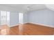 Large bedroom with hardwood floors and ample natural light at 4730 Anson Ln, Orlando, FL 32814