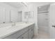 Modern bathroom with double vanity and bathtub at 5286 Tuscany Ln, Davenport, FL 33897