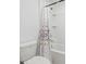 Clean bathroom with shower/tub combo and patterned curtain at 5286 Tuscany Ln, Davenport, FL 33897