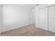 Bright bedroom with carpet flooring and double door closet at 5286 Tuscany Ln, Davenport, FL 33897