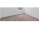 Spacious bedroom with carpeted floor and window with blinds at 5286 Tuscany Ln, Davenport, FL 33897