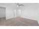 Bedroom with ceiling fan, walk-in closet, and bathroom access at 5286 Tuscany Ln, Davenport, FL 33897