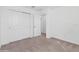 Bright bedroom with carpet flooring and double door closet at 5286 Tuscany Ln, Davenport, FL 33897