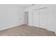 Spacious bedroom with double door closet and neutral carpeting at 5286 Tuscany Ln, Davenport, FL 33897