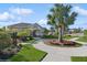 Community center with landscaping and walkway at 5286 Tuscany Ln, Davenport, FL 33897