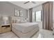 Bright bedroom with wood furniture and neutral decor at 6133 High Seas Dr, Orlando, FL 32821