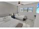 Guest bedroom with two twin beds and beach decor at 6133 High Seas Dr, Orlando, FL 32821