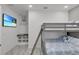 Guest bedroom with a bunk bed and built-in shelving at 6133 High Seas Dr, Orlando, FL 32821