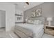 Spacious primary bedroom with a king-size bed and ensuite bathroom at 6133 High Seas Dr, Orlando, FL 32821