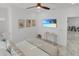 Main bedroom with king bed and access to the dining area at 6133 High Seas Dr, Orlando, FL 32821