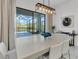 Dining area with large table and access to screened lanai at 6133 High Seas Dr, Orlando, FL 32821