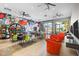 Vibrant game room with colorful seating and a playful atmosphere at 6133 High Seas Dr, Orlando, FL 32821