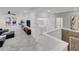Upstairs laundry room with washer, dryer, and shelving at 6133 High Seas Dr, Orlando, FL 32821