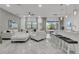 Open-concept living area with sectional sofa and access to backyard at 6133 High Seas Dr, Orlando, FL 32821